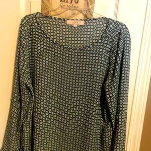 Worn once, blue Loft blouse with flowers and roll up/button sleeve.